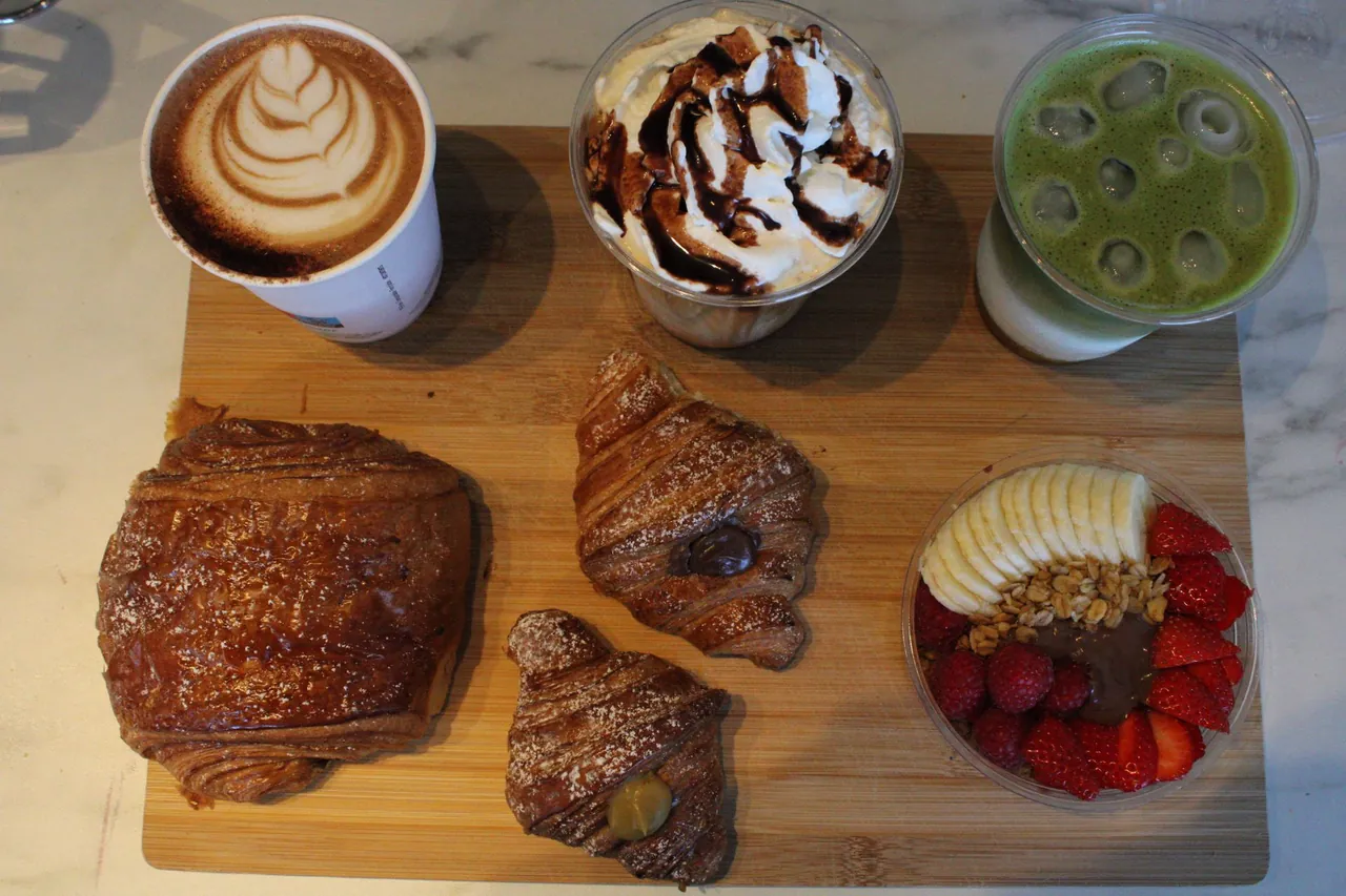 Overhead board of drinks and pastries