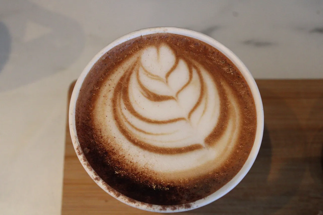 A flat white with leaf latte art